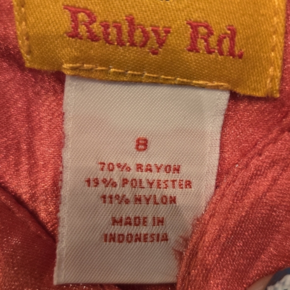 Very pretty, long sleeve shiny, coral colored button up top. Size 8 petite. - Picture 4 of 5